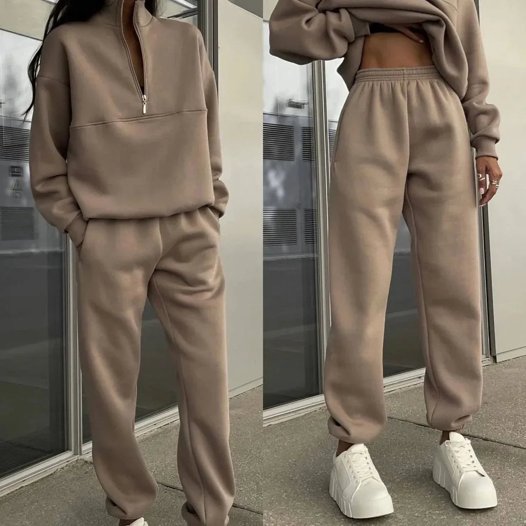Two views of a beige matching casual tracksuit set with zip-up top and elastic jogger pants worn with white platform sneakers