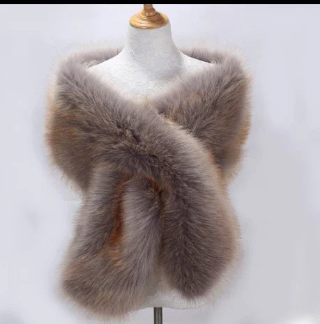 luxurious brown faux fur stole draped on dress form accessory for elegant fashion