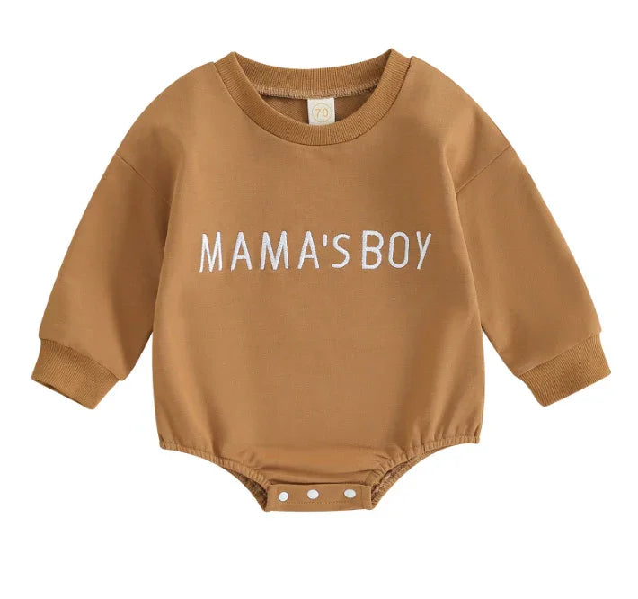 Brown long-sleeve baby onesie with snap buttons and white text reading 'MAMA'S BOY'