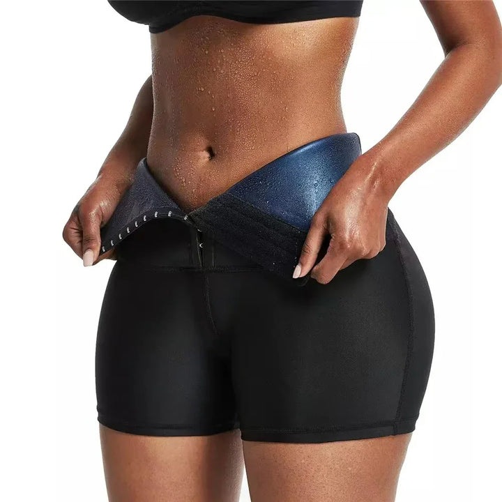 Close-up of fit woman wearing black fitness shorts and blue slimming waist belt in workout setting