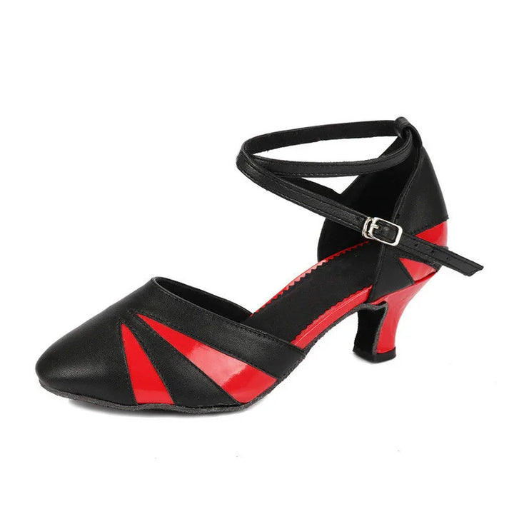 Black and red women's dance shoe with ankle strap and medium heel on white background