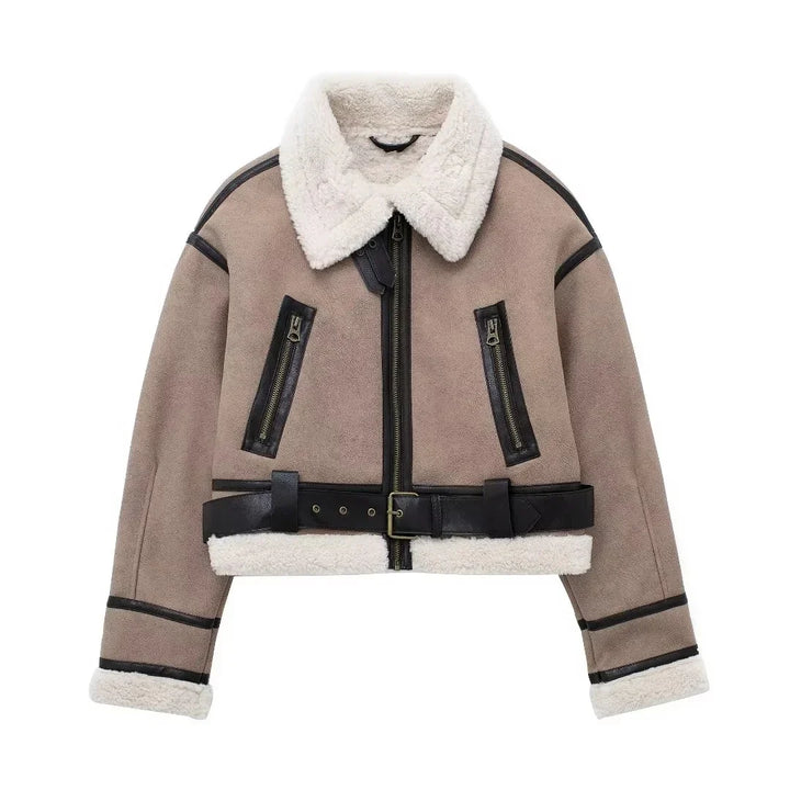 Beige cropped shearling jacket with white fur collar, black trim, zippered pockets, and belt detail