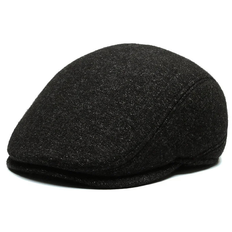 black wool flat cap hat with textured fabric and stitched panels