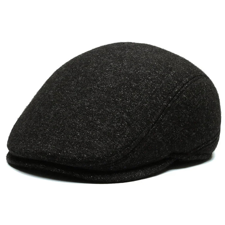 black wool flat cap hat with textured fabric and stitched panels