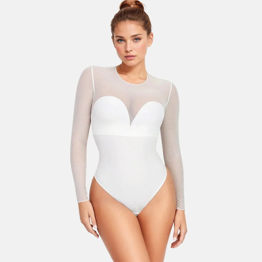 Woman wearing white long-sleeve sheer bodysuit with sweetheart neckline on gray background