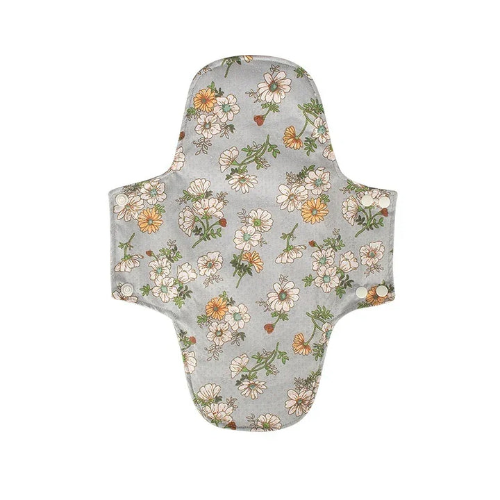 Reusable cloth menstrual pad with grey background and white and yellow floral pattern