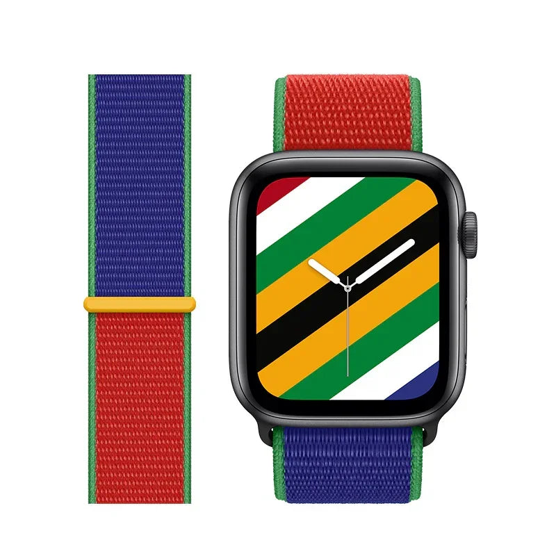 Smartwatch with black case and vibrant multicolor striped nylon band in red, blue, green, yellow, black, and white