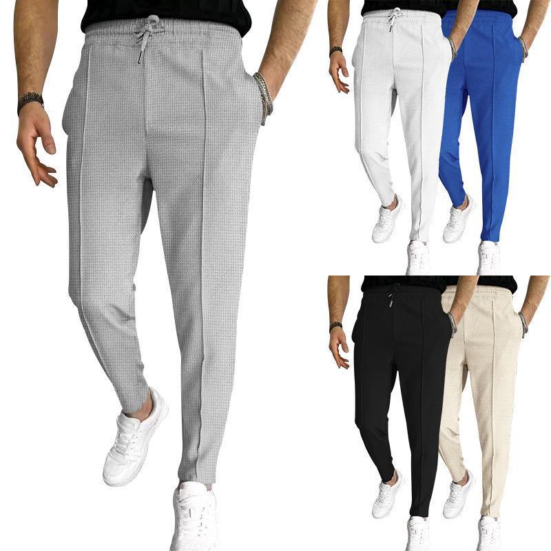 Men's casual jogger pants in gray, white, blue, black, and beige with drawstring waist and side pockets