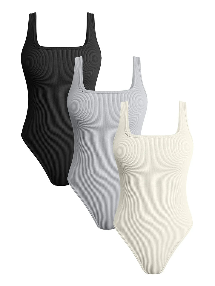 Set of three ribbed bodysuits in black, gray, and cream with square necklines