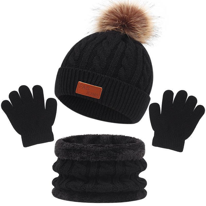 Black winter set including knit beanie with fur pom-pom, gloves, and fleece-lined neck warmer