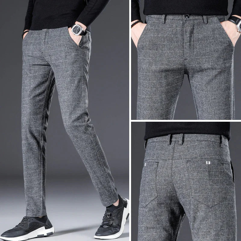 Men's slim fit gray plaid dress pants styled with black sweater and sneakers