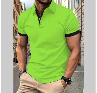 Stylish man wearing bright green polo shirt with black collar and beige pants in urban street setting