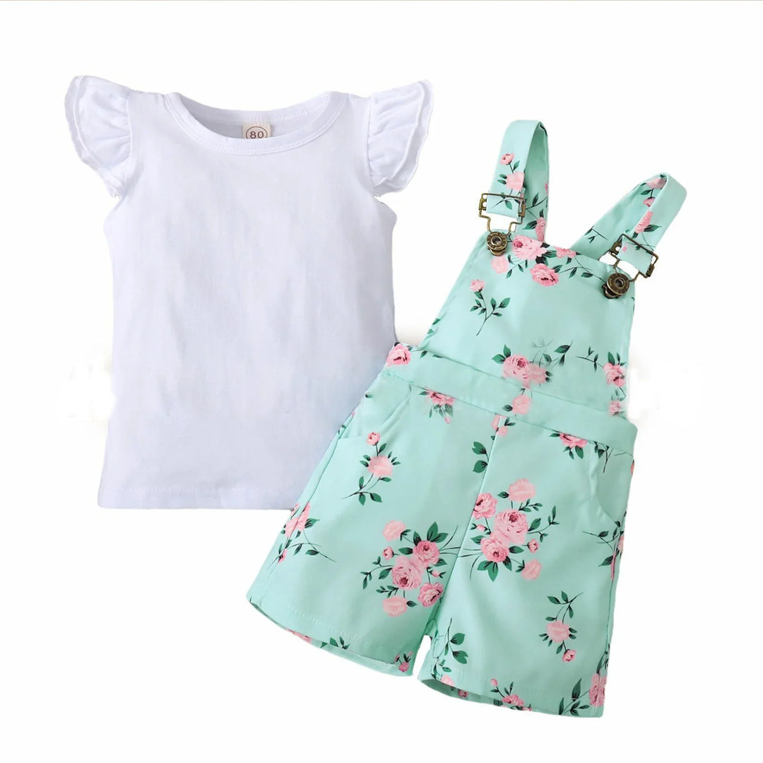 Baby girl outfit with white ruffled sleeve shirt and mint green floral print short overalls