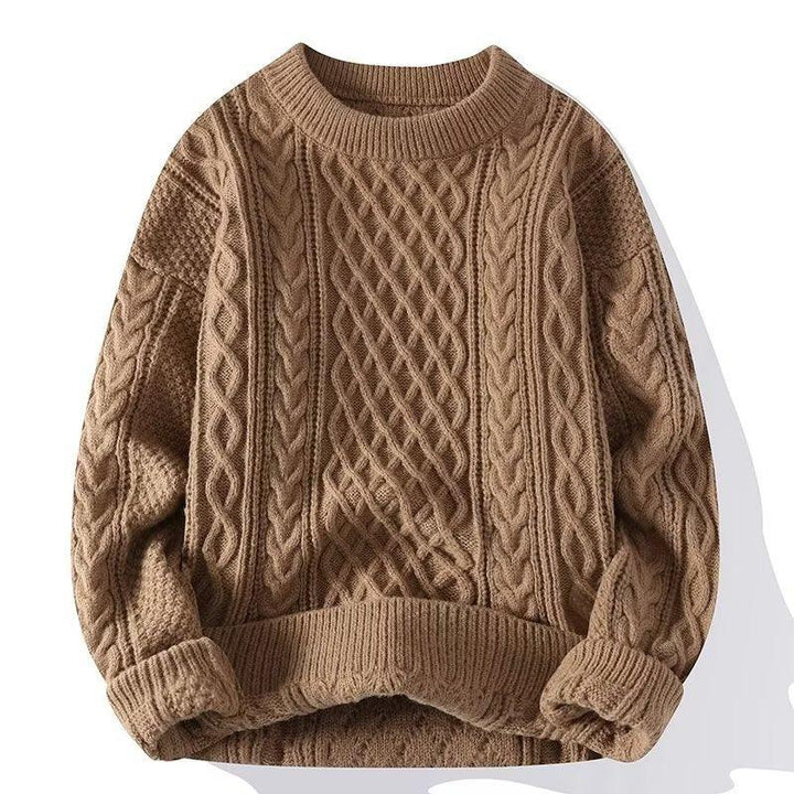 Brown cable knit sweater with intricate patterns and ribbed cuffs, collar, and hem