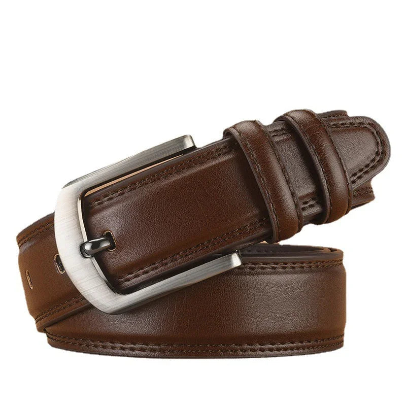 Close-up of a brown leather belt with silver rectangular buckle and stitched edges