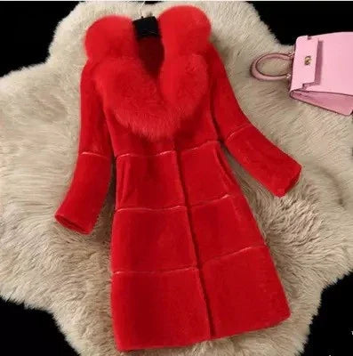 Luxurious red fur coat with large collar displayed on beige fur rug, pink handbag beside