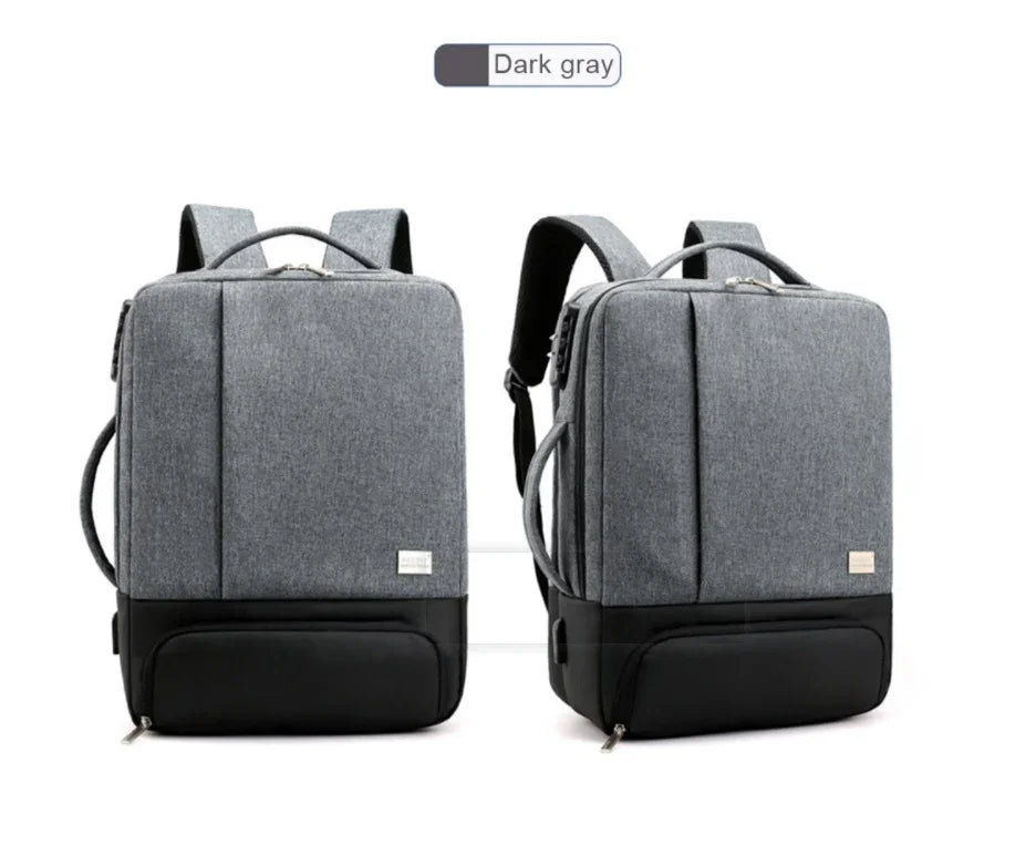Dark gray modern backpack with black bottom, dual handles, and padded shoulder straps, front and side views