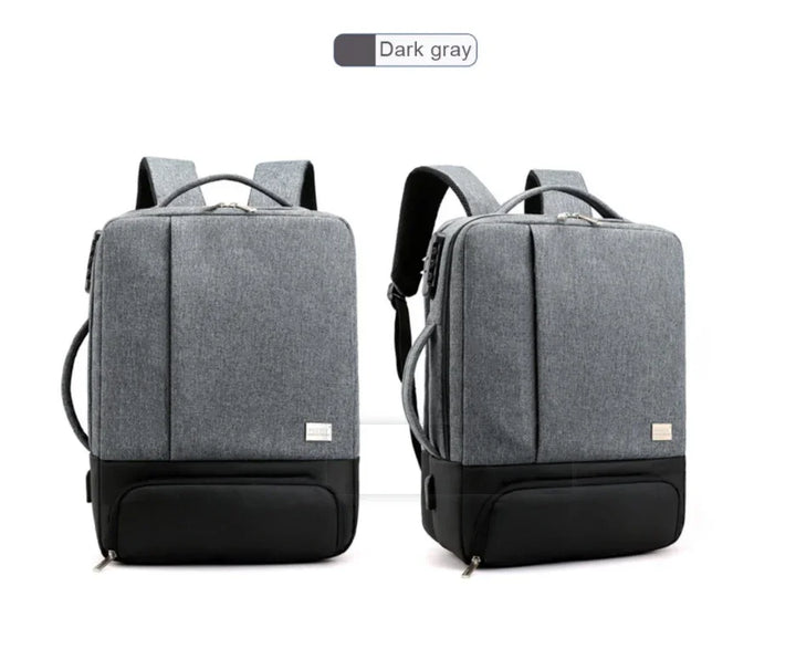 Dark gray modern backpack with black bottom, dual handles, and padded shoulder straps, front and side views