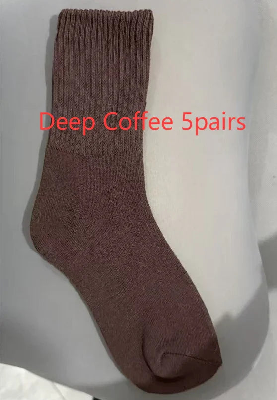 Deep coffee brown ribbed crew sock displayed on white surface