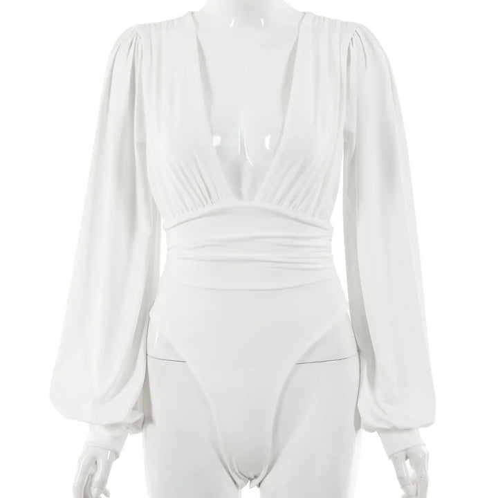 White long sleeve bodysuit with deep V neckline and ruched front detail on mannequin