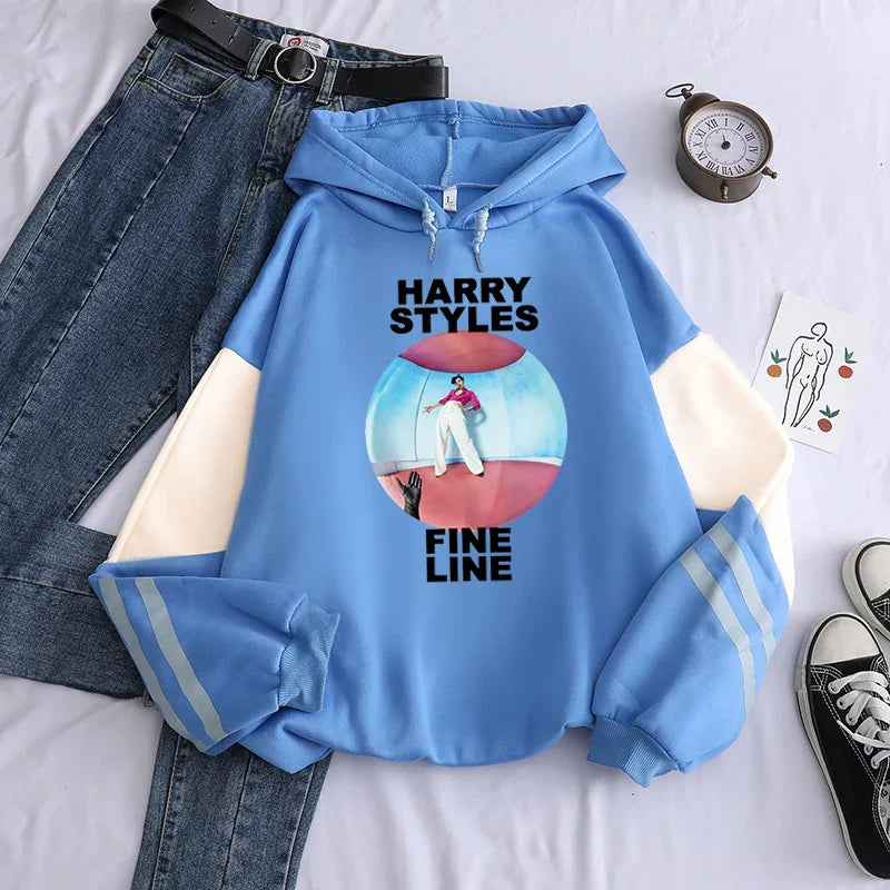 Light blue Harry Styles Fine Line hoodie with photo and text, paired with blue jeans and sneakers