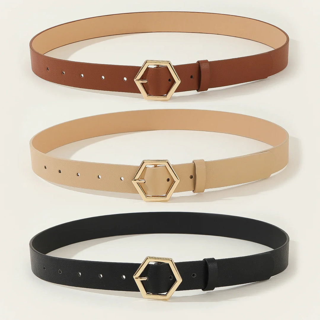 Set of three leather belts in brown, beige, and black with gold hexagon buckles on white background