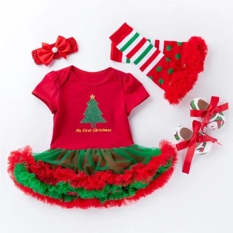 Baby Christmas outfit set with red onesie reading My First Christmas, green and red tutu, striped leg warmers, red headband, and festive shoes