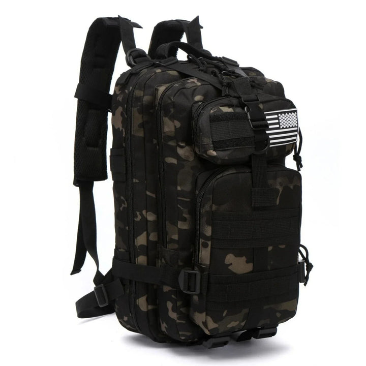 black camouflage tactical backpack with multiple compartments and an American flag patch