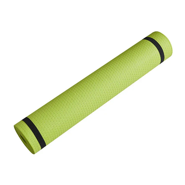 Green textured yoga mat with black bands, fitness accessory on white background