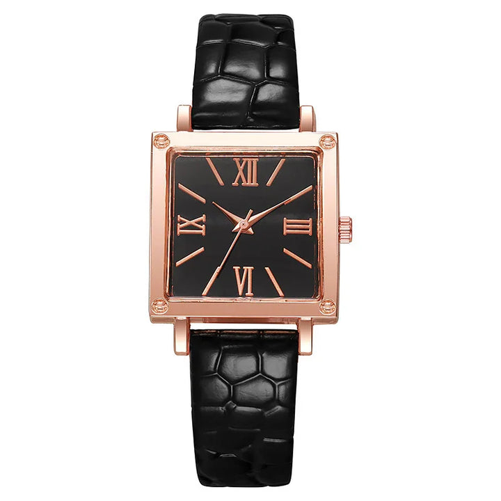 Square rose gold watch with black dial and Roman numerals, black textured leather strap