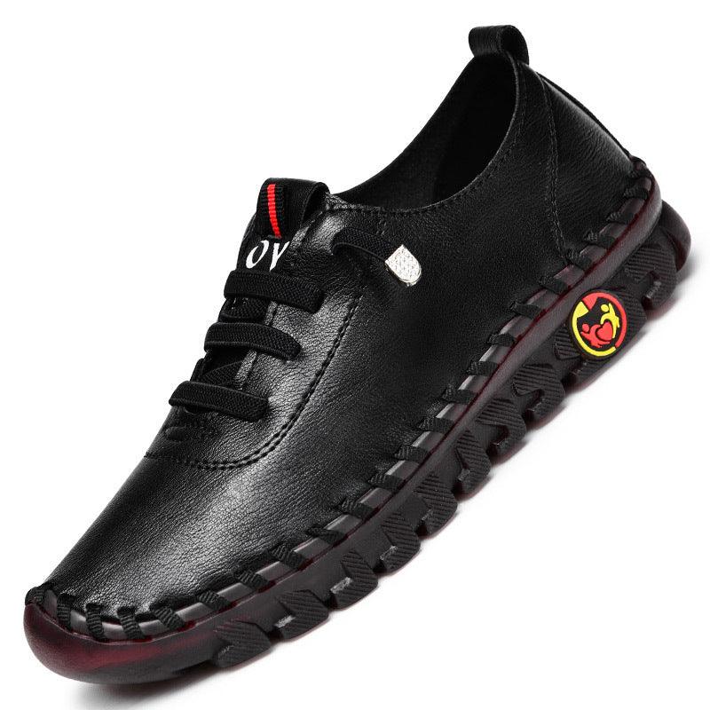 black leather casual sneaker with textured sole and red-yellow logo detail on side