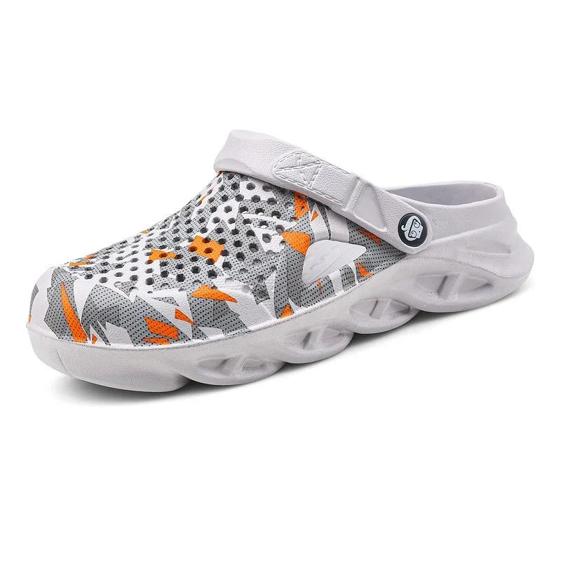 Modern white clog with orange and gray geometric patterns, breathable holes, and cushioned sole