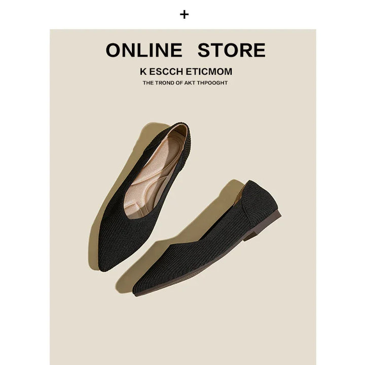Black pointed toe flat shoes displayed on light background for online store fashion
