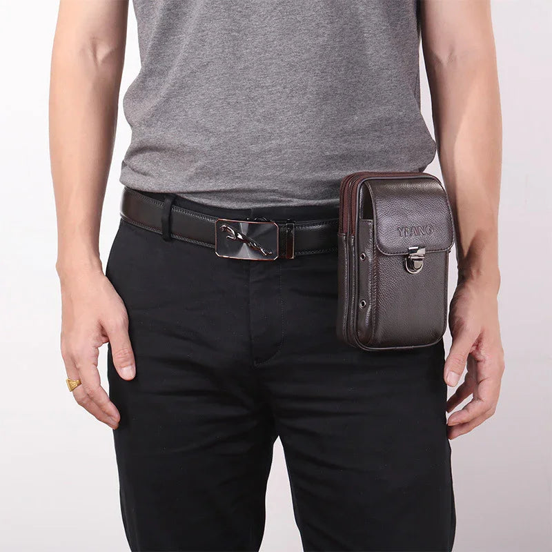 Man wearing black pants, gray shirt, black belt with buckle, and brown leather waist bag pouch