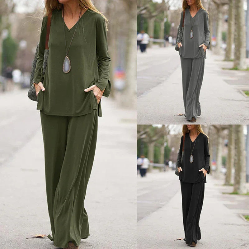 Woman wearing casual long-sleeve top and wide-leg pants outfit in olive green, gray, and black outdoors