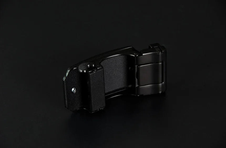 black metal watch clasp buckle isolated on dark background