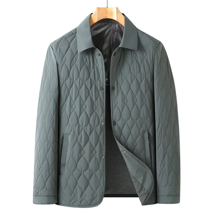 Men's quilted gray jacket with diamond and teardrop stitching, front buttons, and zip pockets