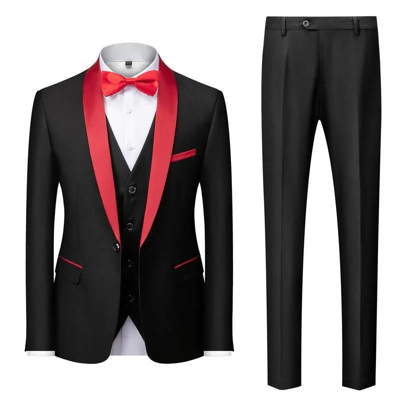 Black tuxedo with red satin lapels, red bow tie, red pocket accents, white shirt, and black trousers