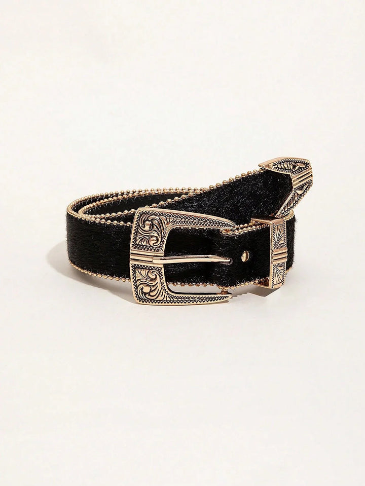 Black leather belt with intricate gold-toned engraved buckle and stitching detail