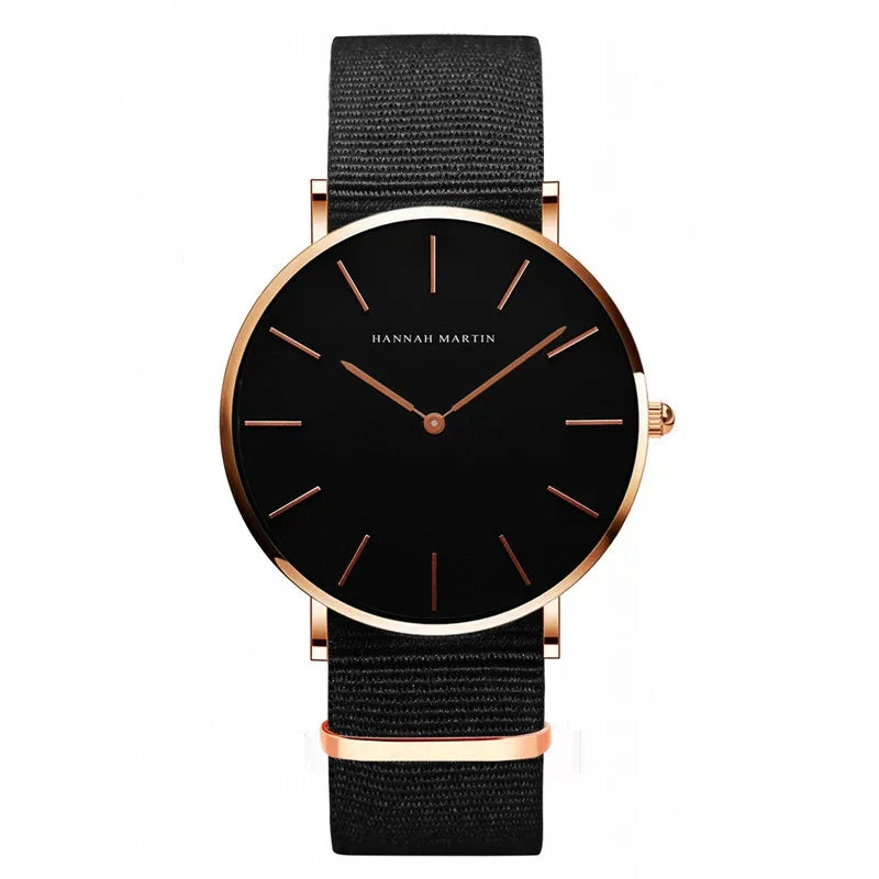 Elegant black Hannah Martin wristwatch with rose gold case and black fabric strap