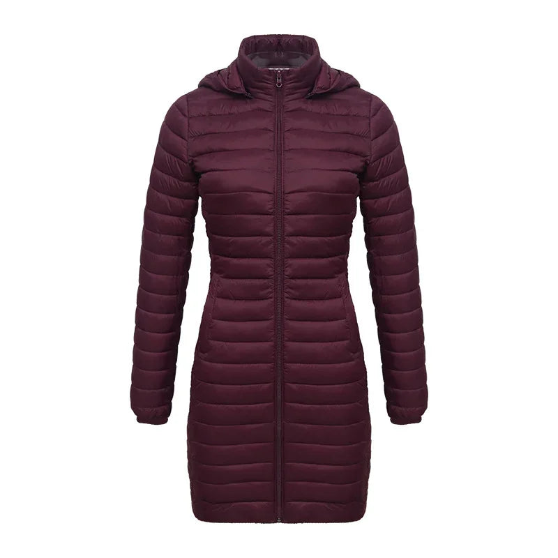 Women's long maroon puffer jacket with hood and front zipper on white background