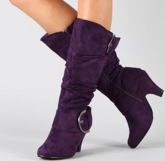 Purple suede mid-calf boots with side zipper and decorative buckle on heels