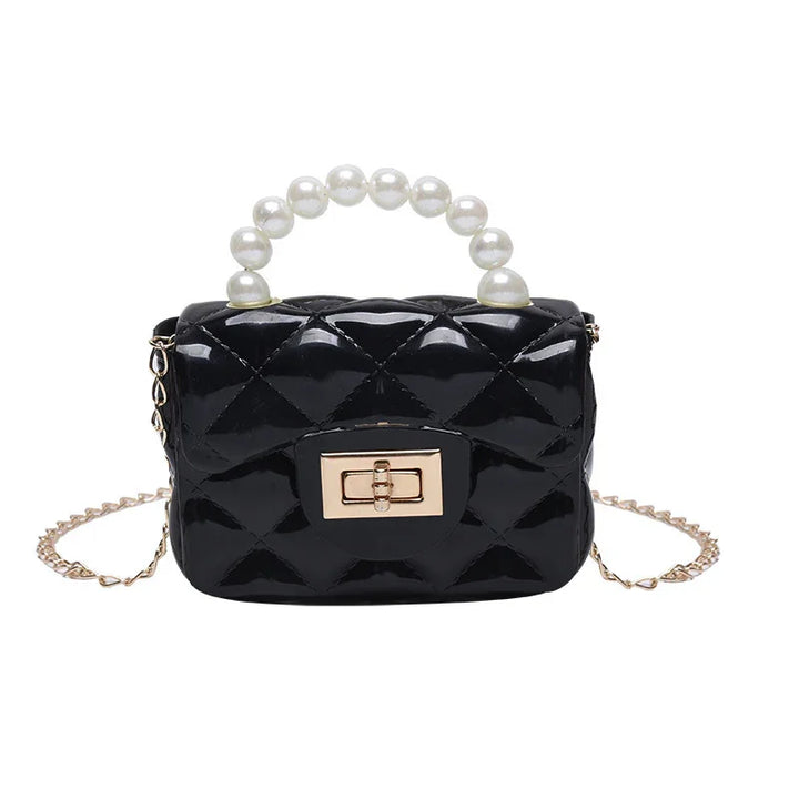 Black patent leather quilted handbag with gold clasp, pearl handle, and gold chain strap