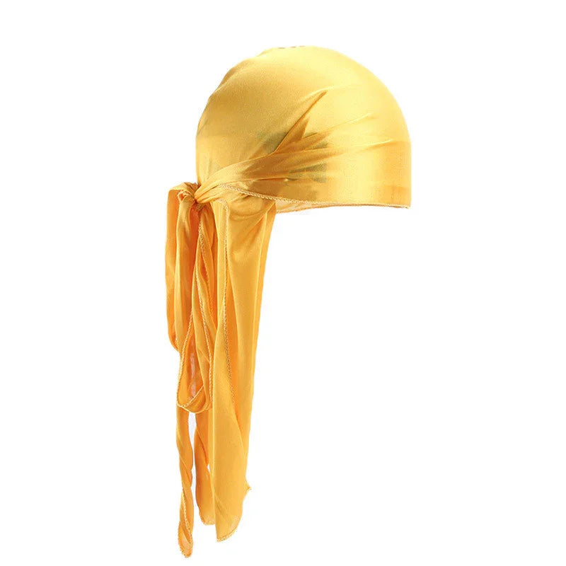 Yellow silky durag bandana with long tied tails on white background