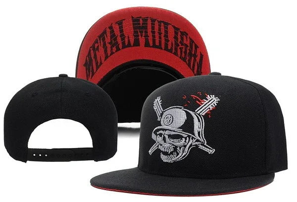 Black snapback cap with embroidered skull wearing helmet and crossed bones logo, red underside brim with text