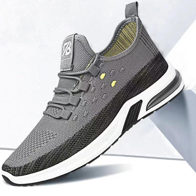 Gray and black lightweight sports running shoe with breathable knit upper and white cushioned sole