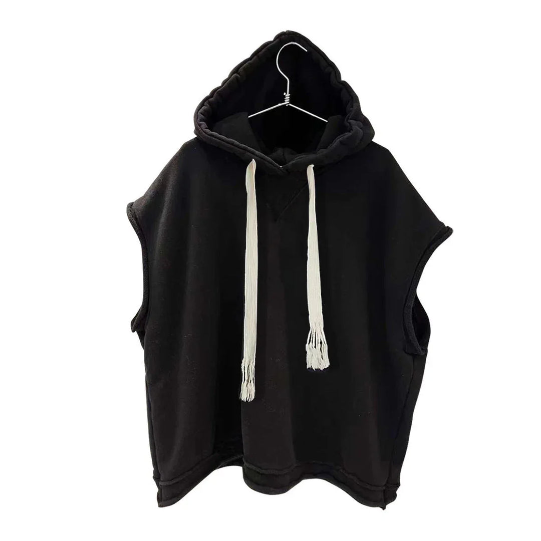 Black sleeveless hooded sweatshirt with large white drawstrings hanging on a hanger