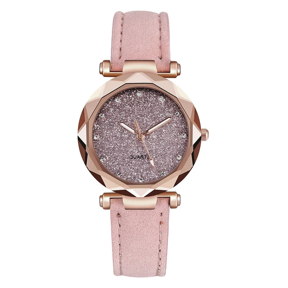 Rose gold quartz watch with glittery face and pink suede strap