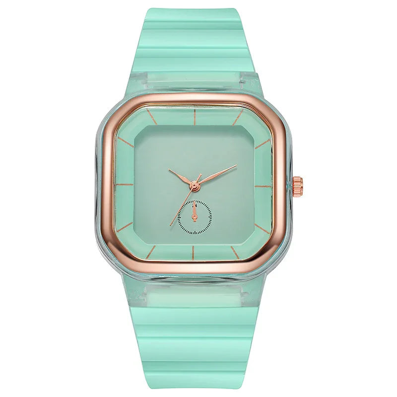 Mint green square wristwatch with rose gold bezel and matching hands on silicone strap
