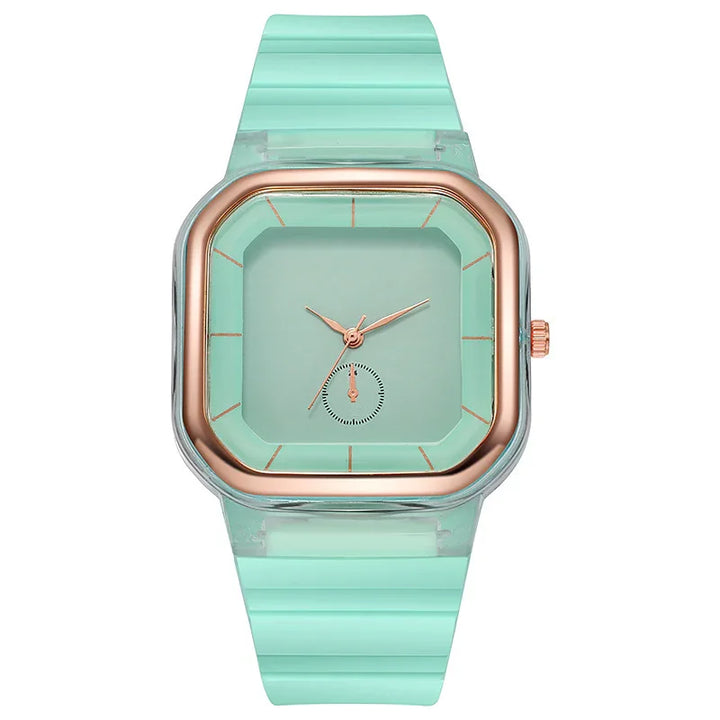 Mint green square wristwatch with rose gold bezel and matching hands on silicone strap